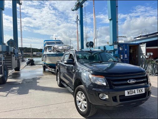 Boat transport via trailer to shamrock quay